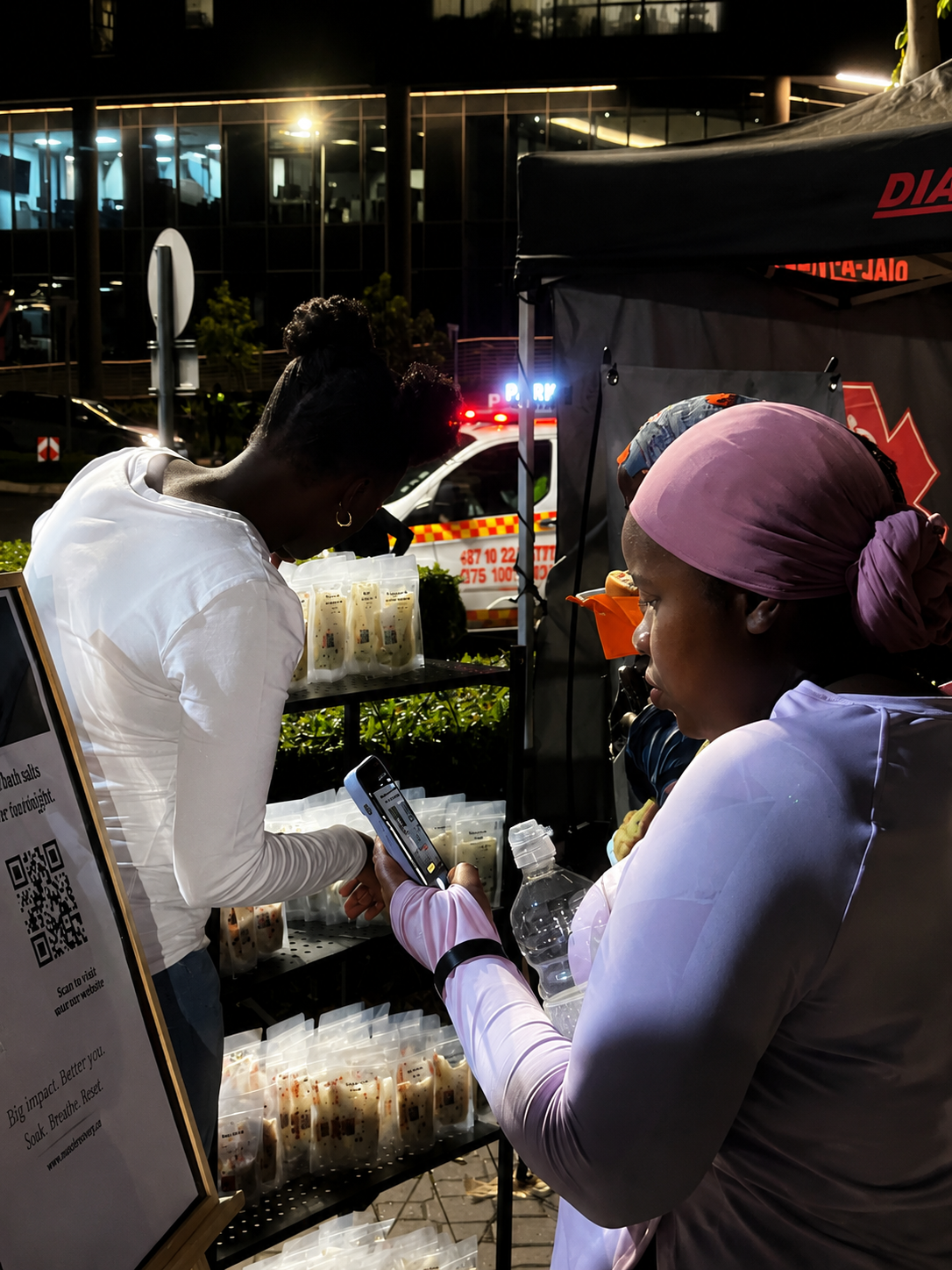 Runners scanning UMSI QR code at recovery station