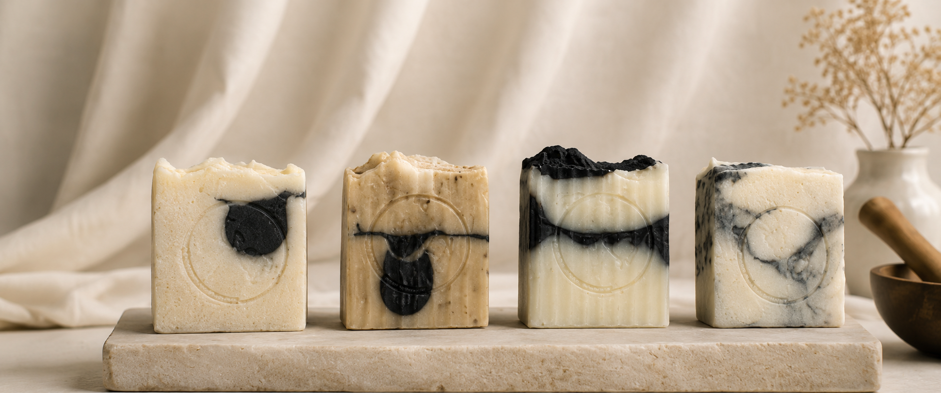 UMSI Charcoal Infused Handcrafted Soap bars on natural linen